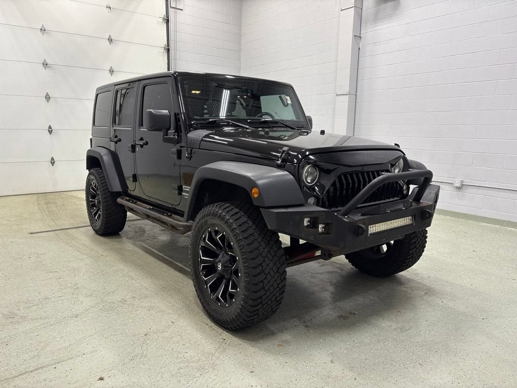 Used 2017 Jeep Wrangler Unlimited Sport S with VIN 1C4BJWDG5HL745403 for sale in Rogers, Minnesota