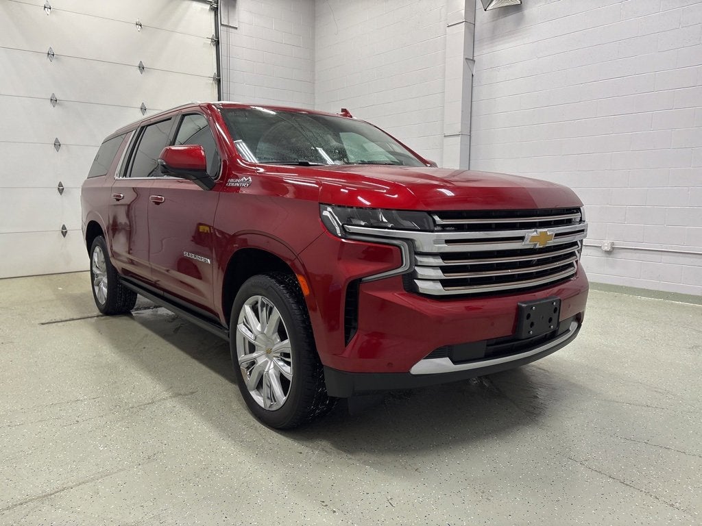 Used 2021 Chevrolet Suburban High Country with VIN 1GNSKGKL7MR344520 for sale in Rogers, Minnesota